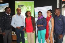 Century Real Estate Rwanda Managing Director Charles Huba (second left) with his team during the company's exhibition at Park Inn By Radisson in Nairobi.